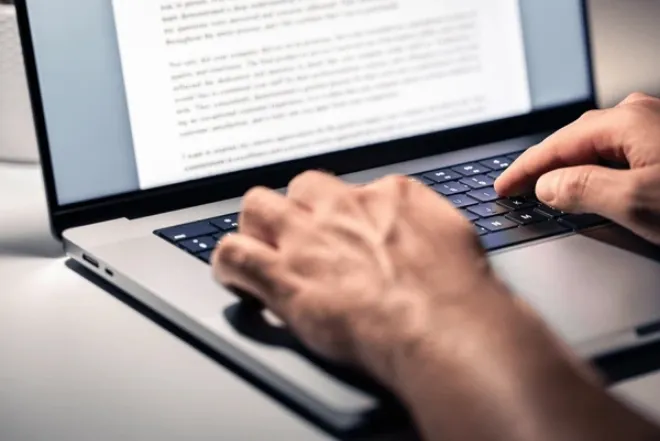 A writer drafting a manuscript